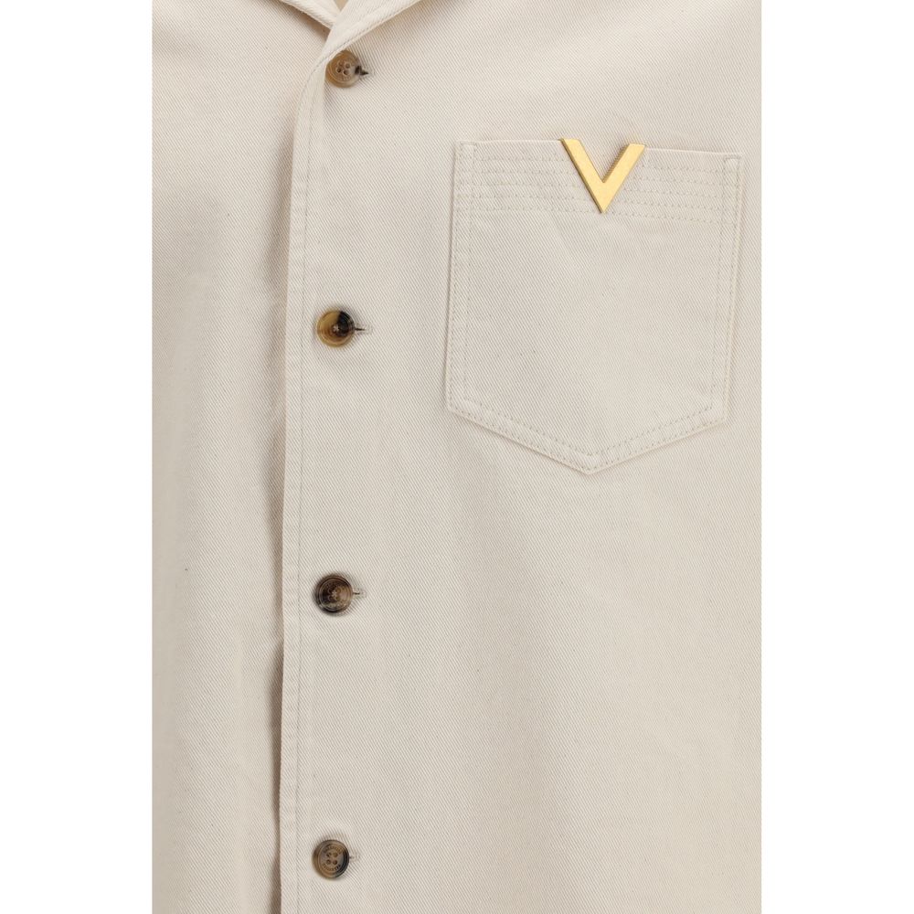 Shirt by Valentino Garavani for men in denim cotton beige, gold & signature features an architectural silhouette with a refined and elegant for a architectural look.