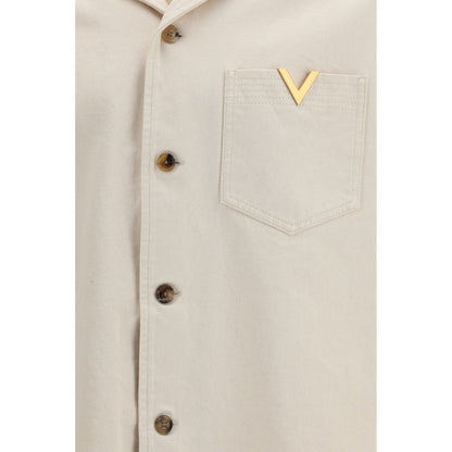 Shirt by Valentino Garavani for men in denim cotton beige, gold & signature features an architectural silhouette with a refined and elegant for a architectural look.