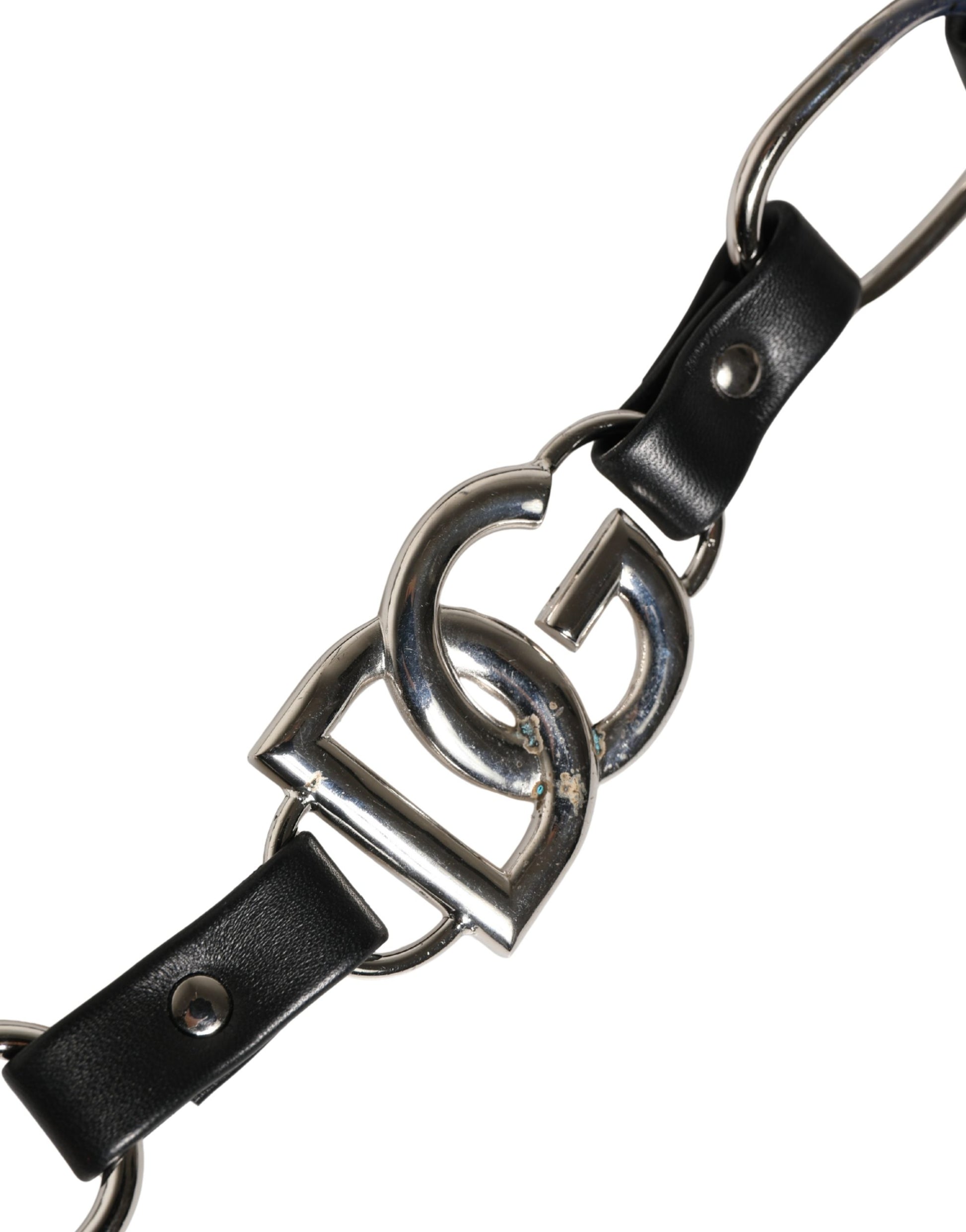 Shoulder Strap by Dolce & Gabbana for women in brass zamak & calf leather black & silver features an stylish design, beautifully completing the signature look of the Brass Zamak Calf Leather Shoulder Strap.