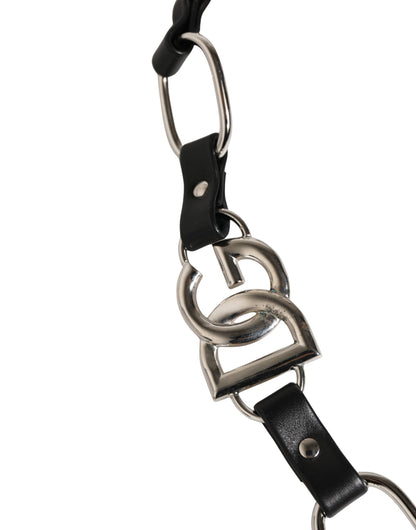 Shoulder Strap by Dolce & Gabbana for women in brass zamak & calf leather black & silver features a dynamic silhouette, artfully enhancing the dynamic design of this Brass Zamak Calf Leather Shoulder Strap.
