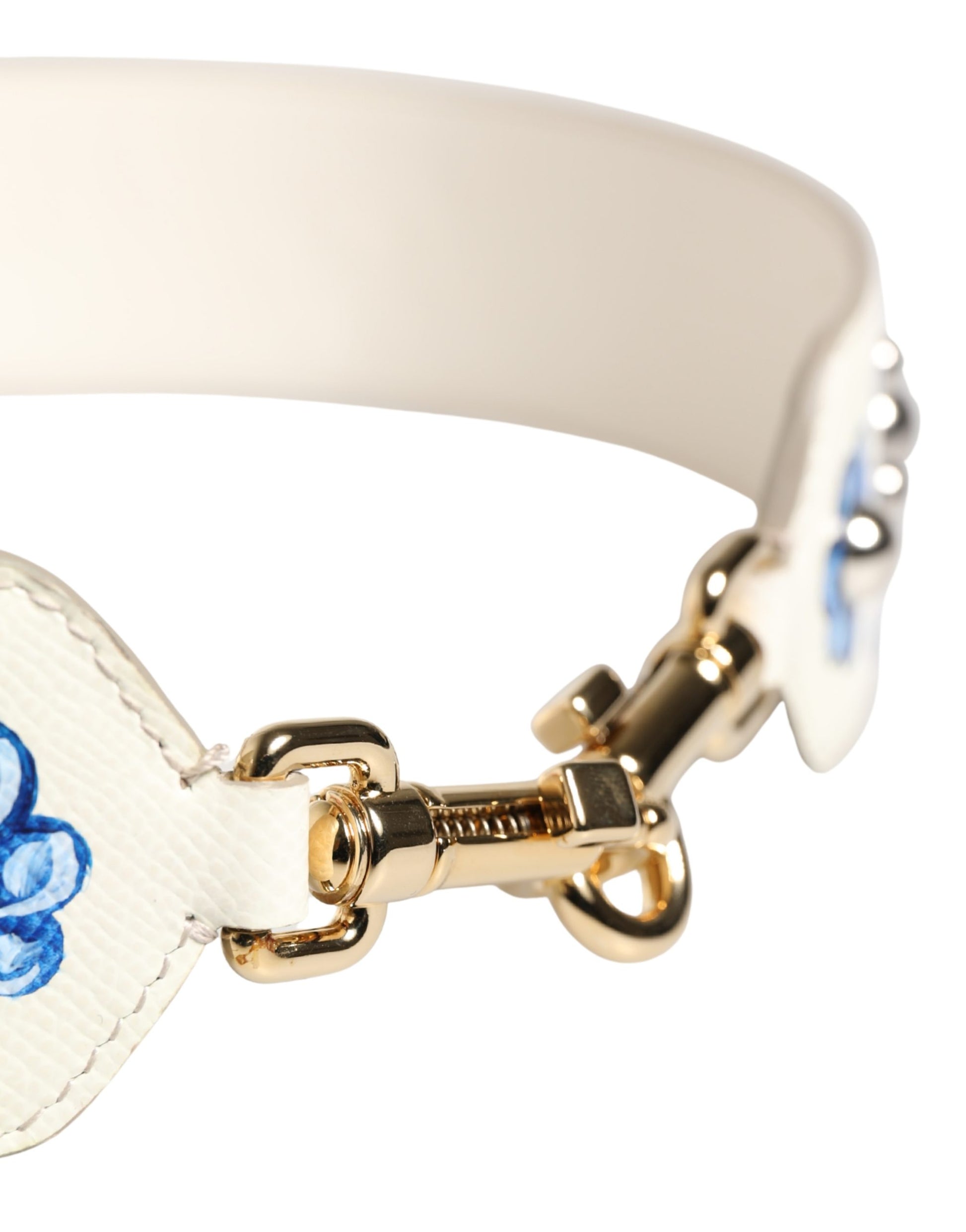 Shoulder Strap by Dolce & Gabbana for women in calf leather blue, gold, silver, white & floral features a effortlessly chic design, perfectly complementing the signature look of the Calf Leather Shoulder Strap.