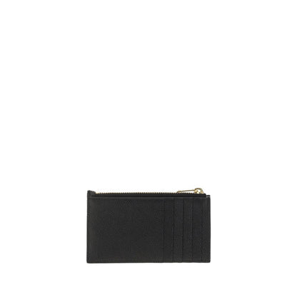 Cardholder Wallet by Saint Laurent for women in bos taurus calfskin leather black showcases a discerning silhouette, artfully capturing the essence of Bos Taurus Calfskin Leather Cardholder Wallet with its functional card-organization.