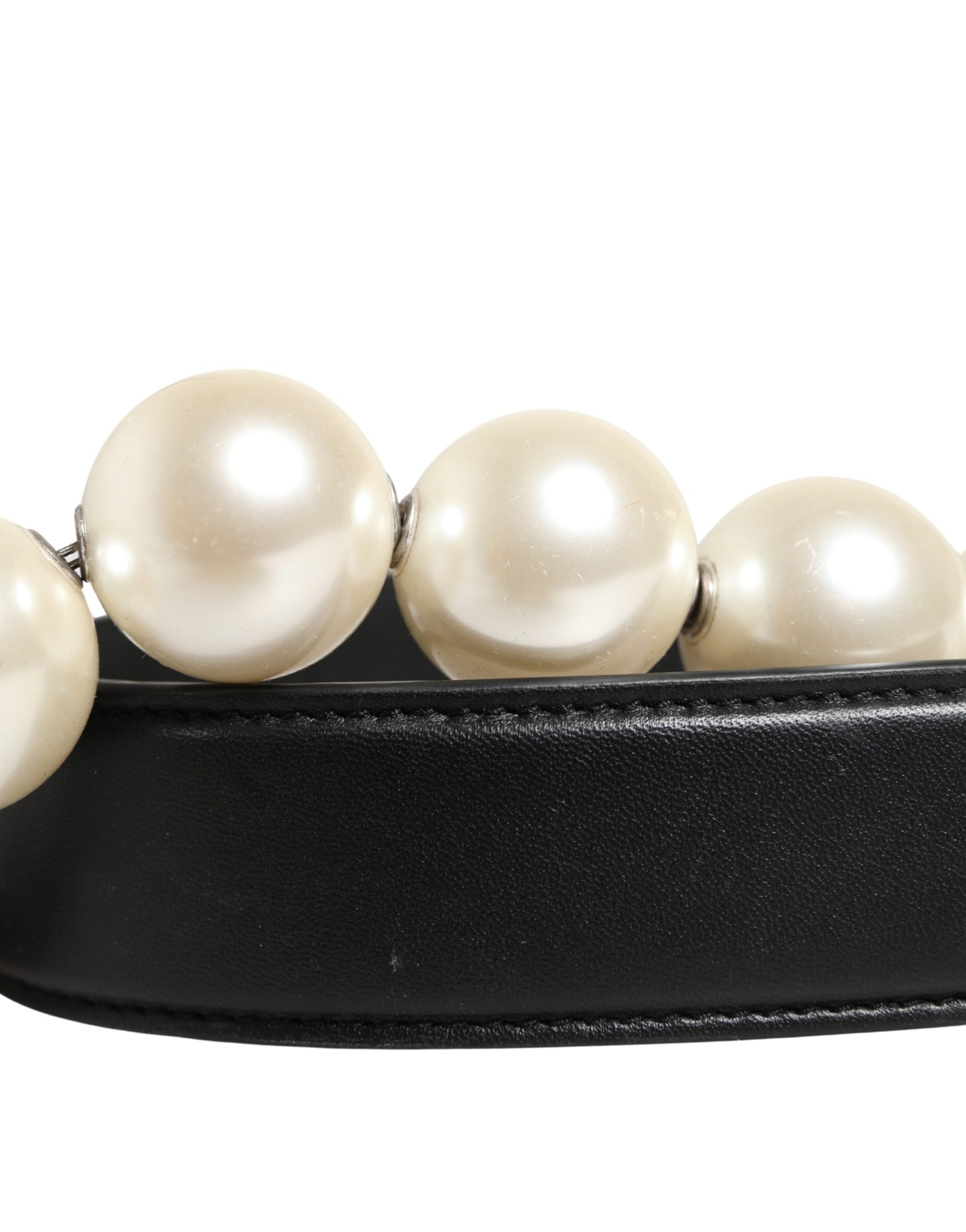 Shoulder Strap by Dolce & Gabbana for women in brass zamak & calf leather black, pearl, silver & white features a effortlessly chic design, perfectly complementing the signature look of the Brass Zamak Calf Leather Shoulder Strap.