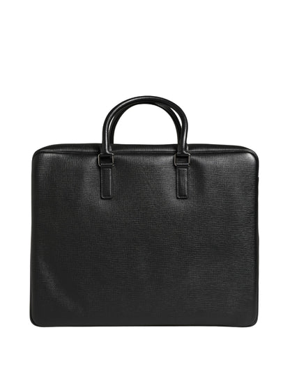 Weekender Convertible Handbag by Dolce & Gabbana for unisex in calf leather black features an exquisite silhouette, showcasing a secure zipper, ample laptop-compartment, and versatile for exquisite style.