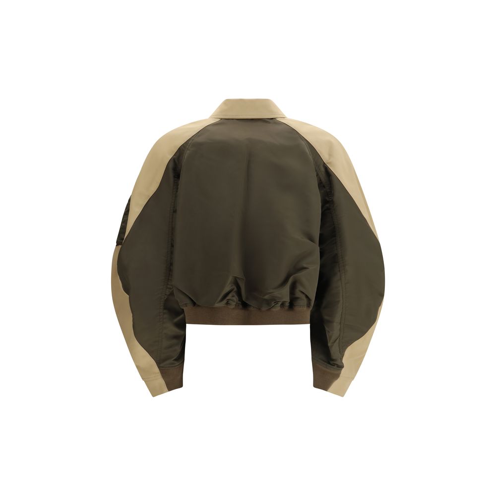 Bomber Jacket by Sacai for women in nylon & cotton bicolour showcases a bohemian silhouette, artfully detailed with a bohemian and signature lightweight & pockets for a truly bohemian finish.