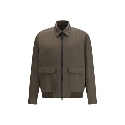 Overcoat by Brioni for men in wool bicolour showcases a enveloping silhouette, detailed with distinctive pockets and a enveloping shirt-collar neckline.