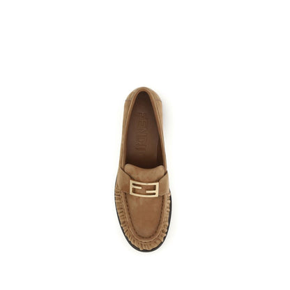 Flat Loafer Slip-On Shoes by Fendi for women in bos taurus suede calf leather brown features an ergonomic silhouette, perfectly showcasing Women's Bos Taurus Suede Calf Leather Flat Loafer Slip-On Shoes with its distinct flat and elegant round toe style.