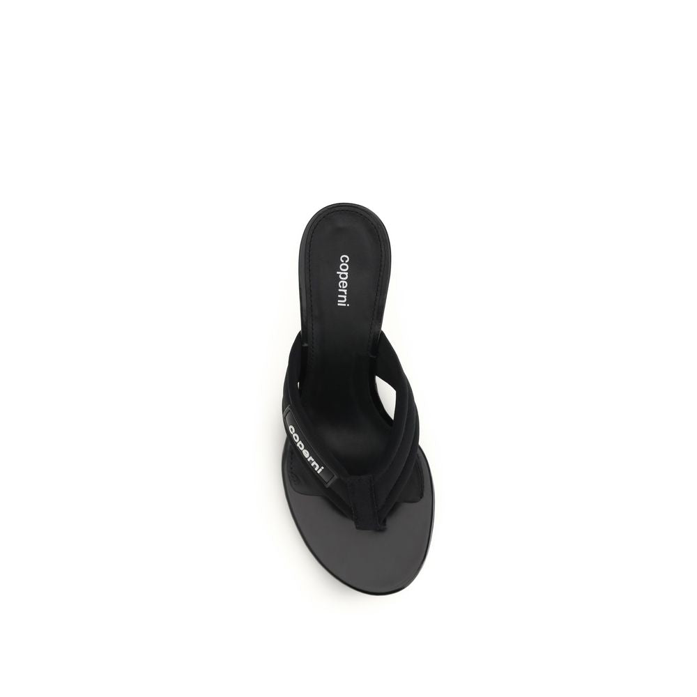 Wedge Flip-Flop Sandals by Coperni for women in polyamide black features an statuesque Women's Polyamide Wedge Flip-Flop Sandals silhouette with a refined wedge and elegant .