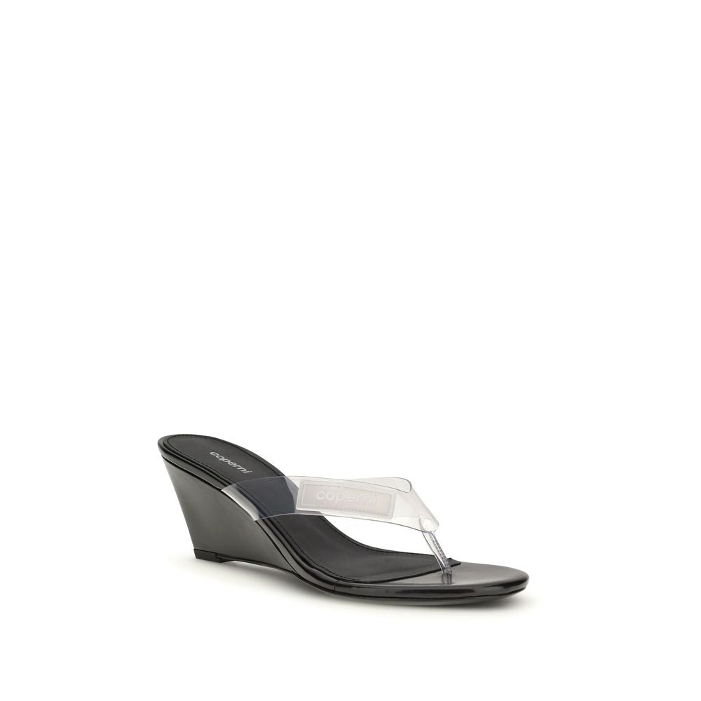 Wedge Flip-Flop Sandals by Coperni for women in pvc black & transparent features an exquisite silhouette, showcasing the exquisite Women's PVC Wedge Flip-Flop Sandals with a wedge and .