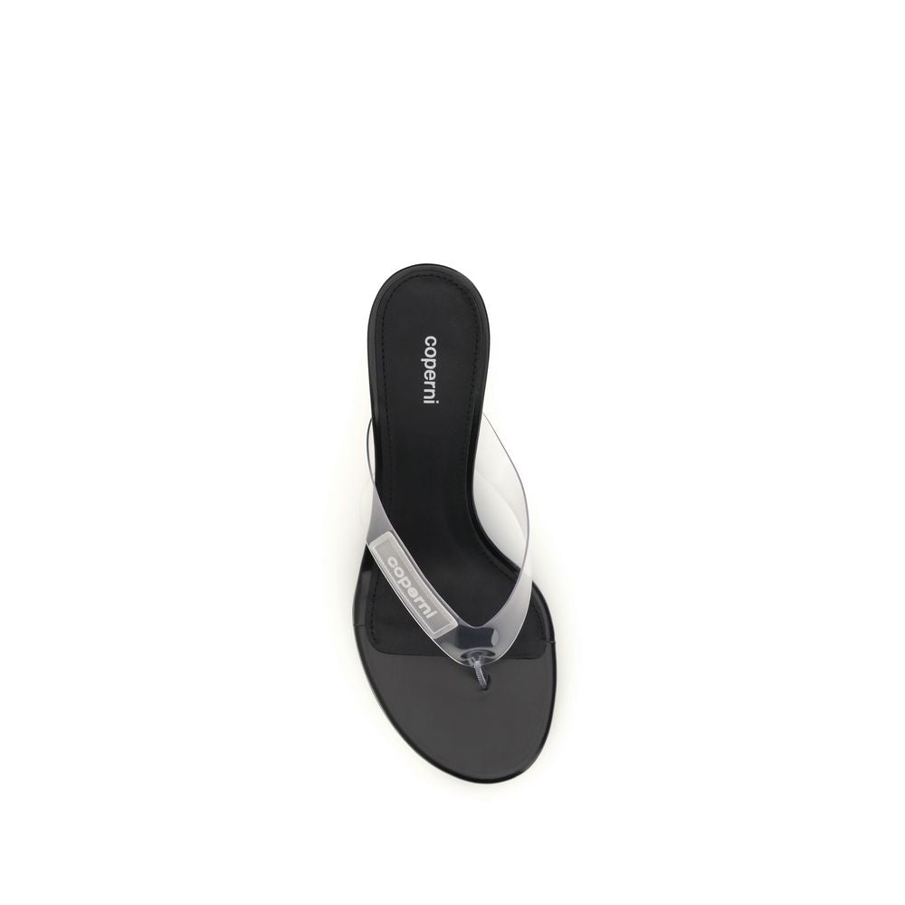 Wedge Flip-Flop Sandals by Coperni for women in pvc black & transparent features an statuesque Women's PVC Wedge Flip-Flop Sandals silhouette with a refined wedge and elegant .