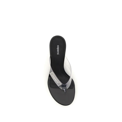 Wedge Flip-Flop Sandals by Coperni for women in pvc black & transparent features an statuesque Women's PVC Wedge Flip-Flop Sandals silhouette with a refined wedge and elegant .