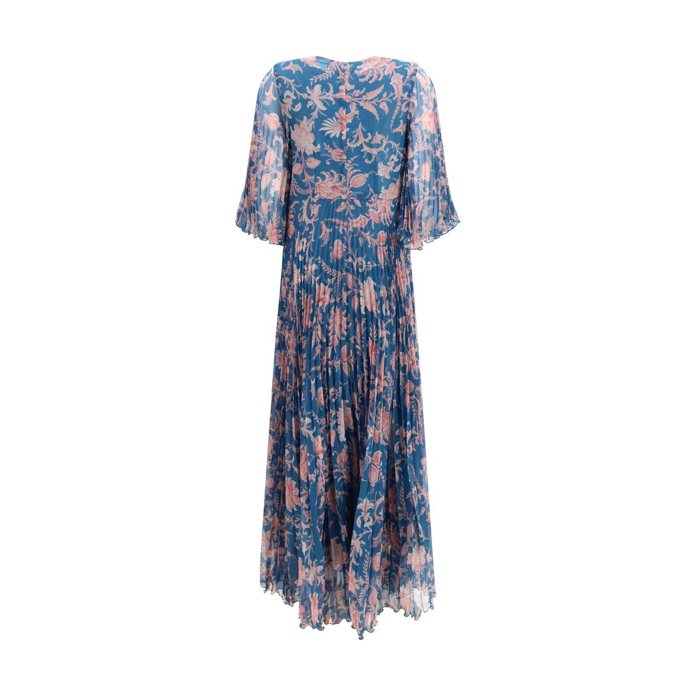 Dress by Etro for women in polyester blue & patterned features an cute silhouette, detailed with a and v-neck neckline that elegantly flows into a cute maxi long.
