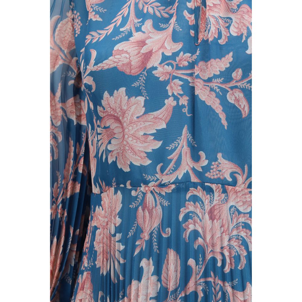 Dress by Etro for women in polyester blue & patterned features an sultry silhouette defined by a and , falling to an sultry maxi long for a sultry look.