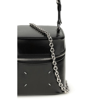 Bucket Shoulder Bag by Maison Margiela for women in bos taurus calf leather black, white & signature features a distinguished silhouette, showcasing a secure zipper and distinguished with versatile shoulder-strap, handle & adjustable-strap for a distinguished finish.