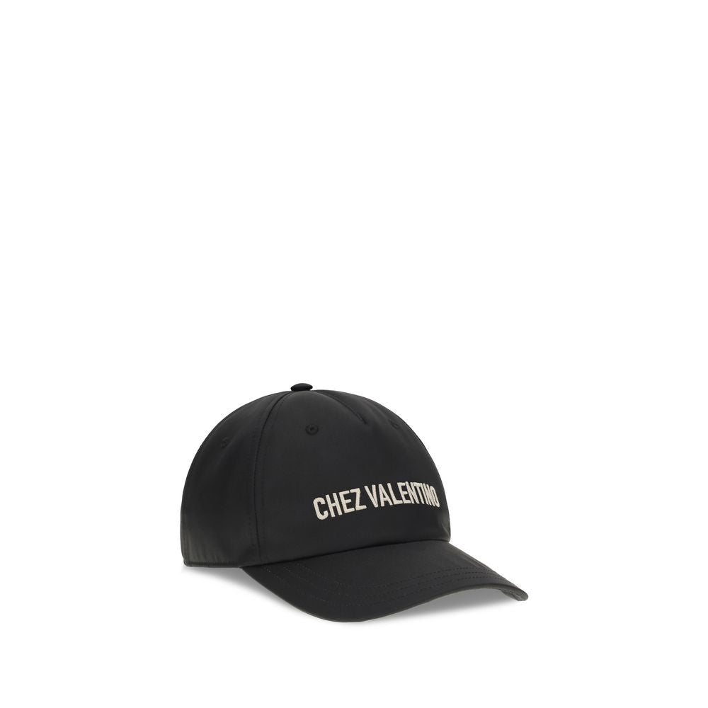 Baseball Cap by Valentino Garavani for men in cotton black features a distinguished silhouette, artfully capturing the essence of the distinguished Cotton Baseball Cap design with a sophisticated style.