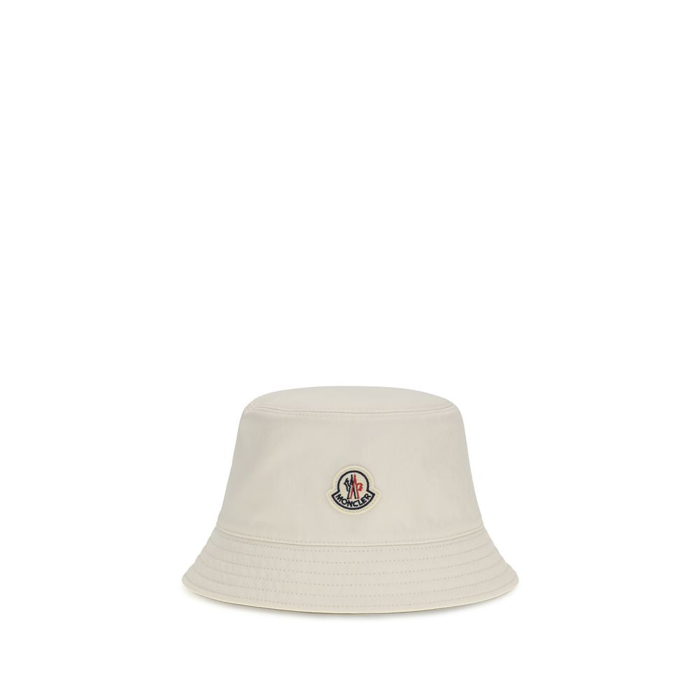 Bucket Hat by Moncler for women in polyester white showcases a effortlessly chic silhouette, artfully capturing the essence of the effortlessly chic Polyester Bucket Hat design for a sophisticated look.
