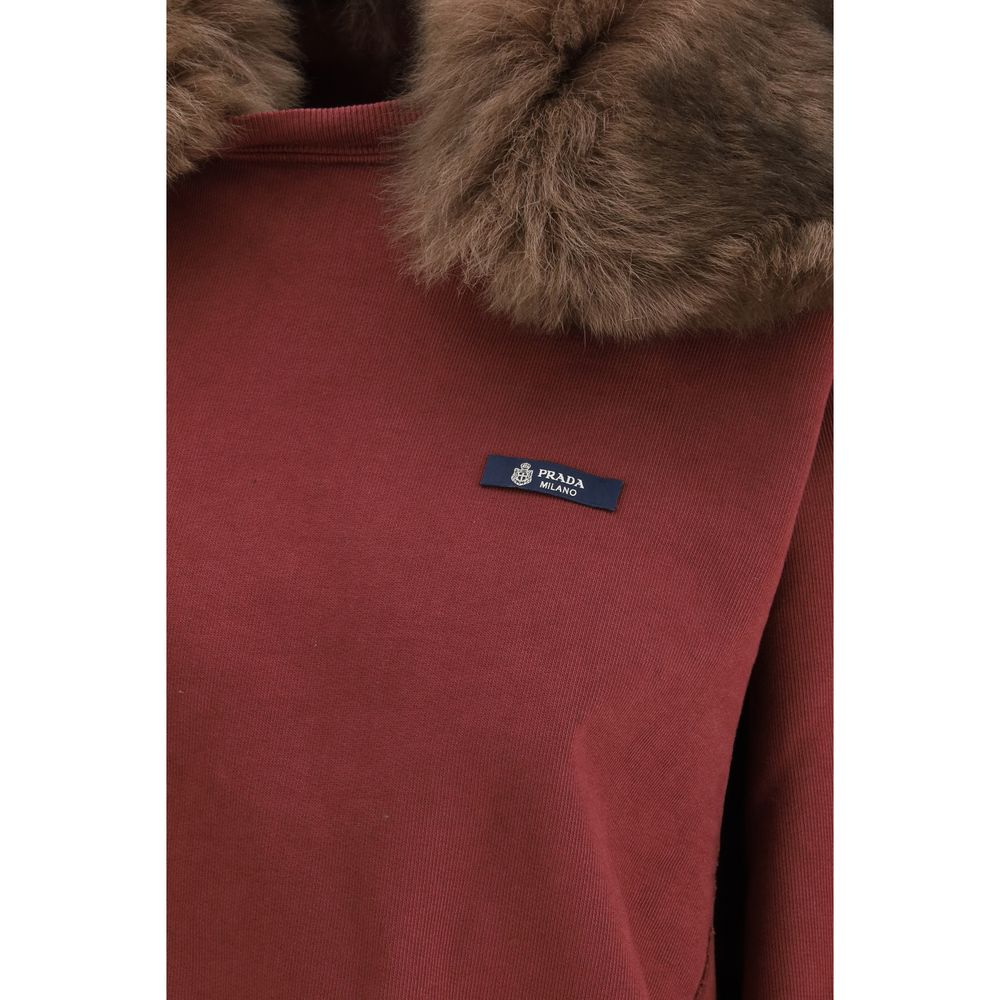 Sweatshirt by Prada for women in cotton bordeaux showcases a slouchy chic silhouette, artfully detailed with a slouchy chic and for a slouchy chic finish.