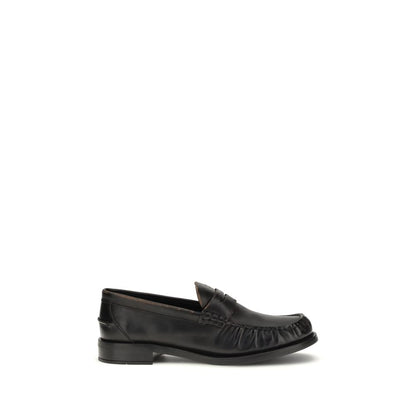 Flat Loafer Slip-On Shoes by Prada for women in bos taurus calf leather black features an ergonomic silhouette, perfectly showcasing Women's Bos Taurus Calf Leather Flat Loafer Slip-On Shoes with its distinct flat and elegant round toe style.