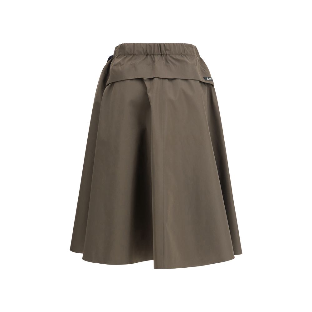Skirt by Prada for women in tu polyester polyurethane & nylon bicolour showcases a sultry silhouette, elegantly defined by its midi and the sophisticated sultry design of the Ribbon Women's Tailored TU Polyester Polyurethane & Nylon Midi Skirt.