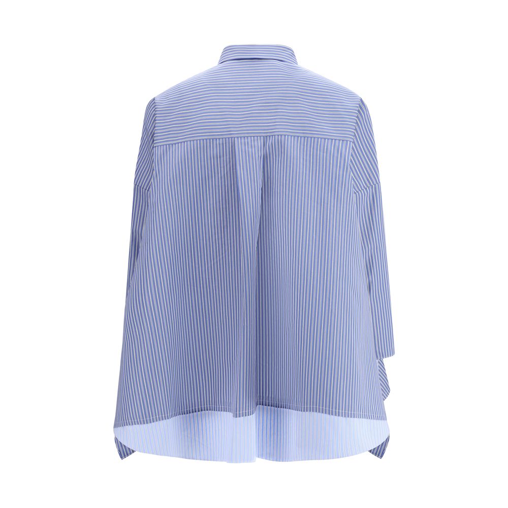 Shirt by Sacai for women in cotton & polyester blue, patterned & striped showcases a sharp silhouette, elegantly detailed with a sharp and sharp .