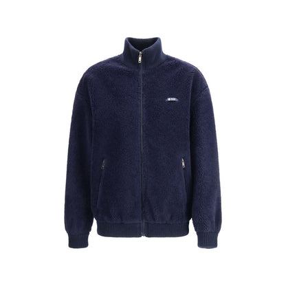 Overcoat by Prada for women in polyamide wool blue & signature showcases a enveloping silhouette, detailed with distinctive pockets and a enveloping .
