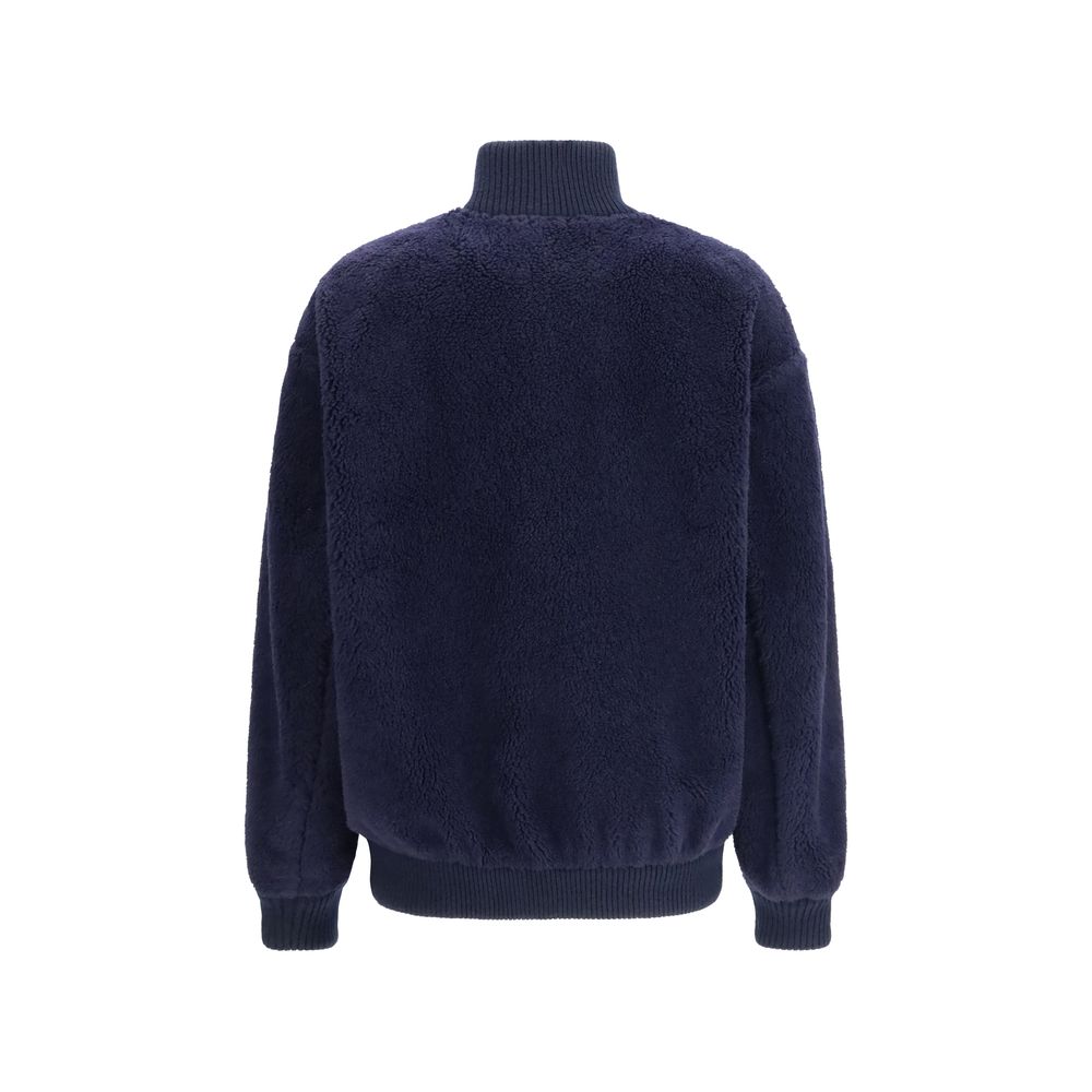 Overcoat by Prada for women in polyamide wool blue & signature features a cosy chic silhouette, artfully detailed with a sophisticated and premium pockets for a cosy chic finish.