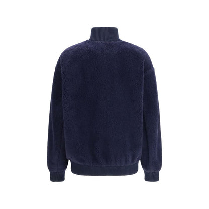 Overcoat by Prada for women in polyamide wool blue & signature features a cosy chic silhouette, artfully detailed with a sophisticated and premium pockets for a cosy chic finish.