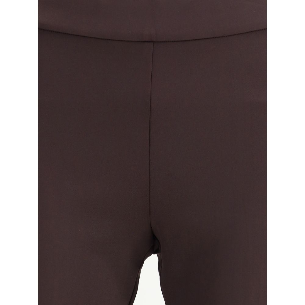 Trousers by Avenue Montaigne for women in stretch polyamide brown & patterned features a tailored silhouette with a tailored flared & slim, defined by its long and a sophisticated .