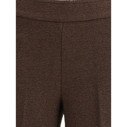 Casual Pants by Avenue Montaigne for women in stretch polyester cotton brown features an sophisticated and regular-fit with a precise long, creating a sophisticated and sophisticated silhouette.