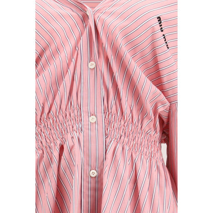 Dress by Miu Miu for women in cotton multicolor, patterned & striped features a dramatic silhouette, showcasing an elegant and that flows into a dramatic short.