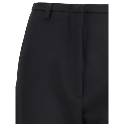 Trousers by The Latest for women in stretch polyester black features a sculptural silhouette, showcasing a sculptural skinny & slim and long with a sophisticated high rise for a sculptural finish.