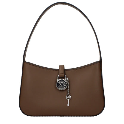 This Handbag by Michael Kors for women in leather and brown presents a sculptural silhouette featuring a secure , ample , and versatile adjustable-strap for a sculptural finish.