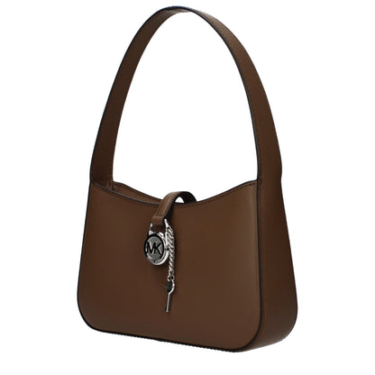 Handbag by Michael Kors for women in leather brown features a ornamental silhouette, showcasing a secure , ample , and ornamental adjustable-strap for a sophisticated look.