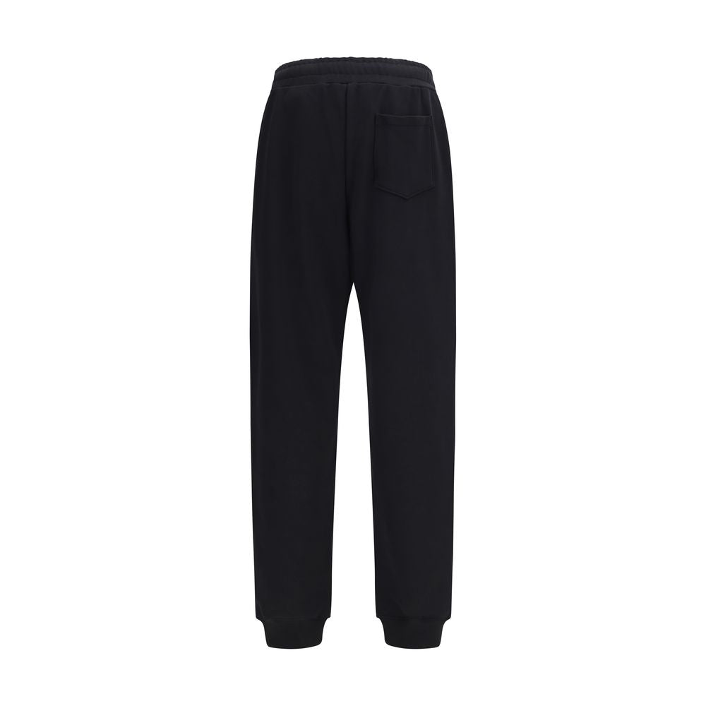 Jogger Sweatpants by Moschino for men in cotton black & signature features an ergonomic straight, relaxed-fit & regular-fit and with a ergonomic long, showcasing innovative for a ergonomic look.