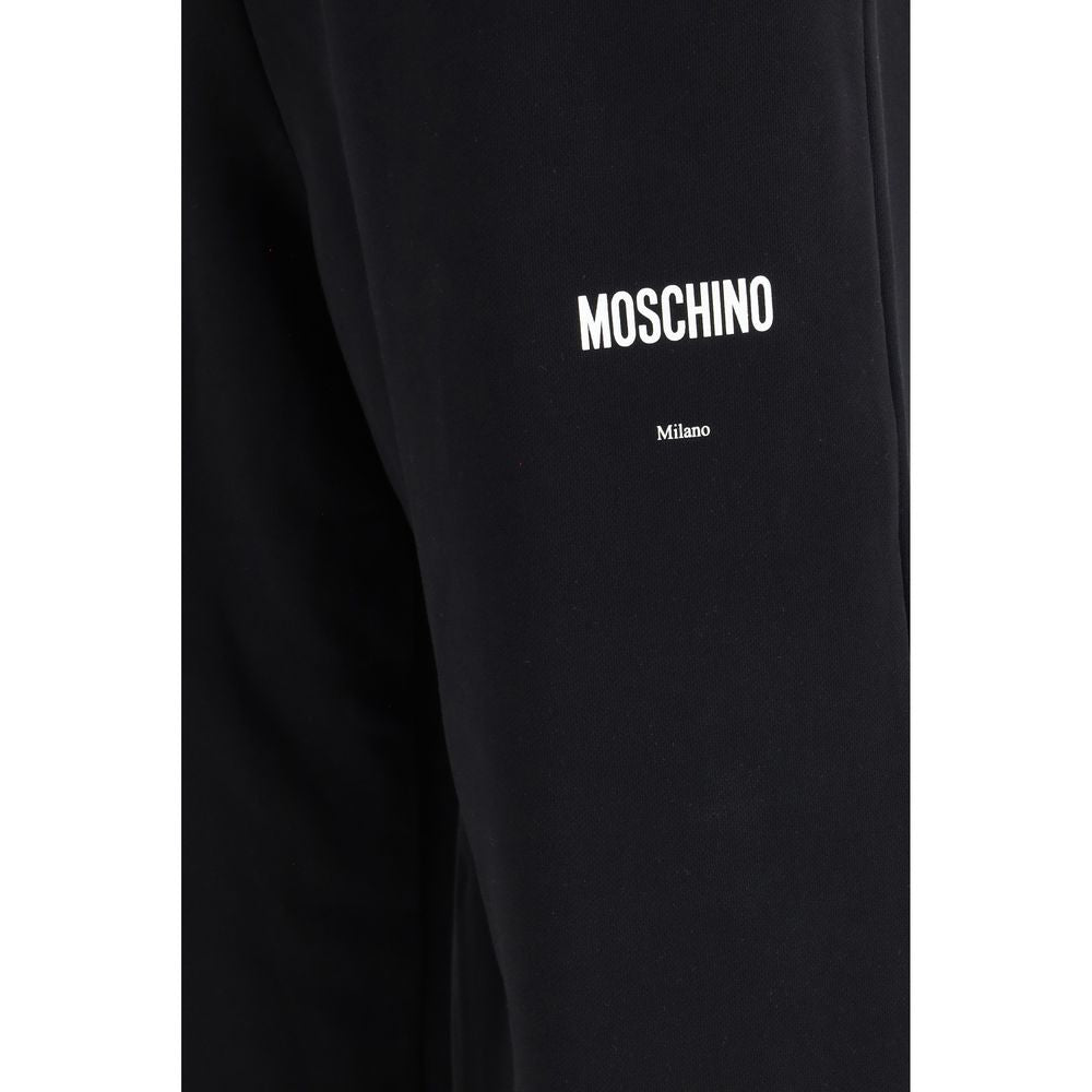Jogger Sweatpants by Moschino for men in cotton black & signature features an sporty straight, relaxed-fit & regular-fit with a and long, showcasing sporty .