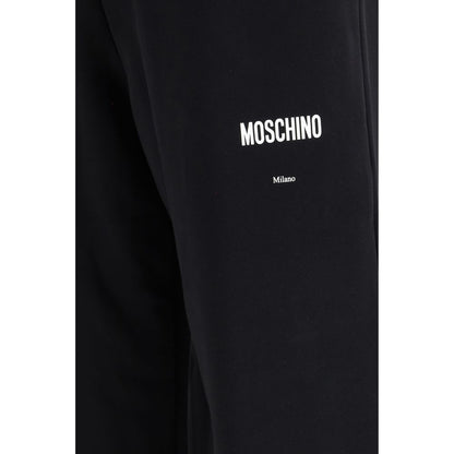 Jogger Sweatpants by Moschino for men in cotton black & signature features an sporty straight, relaxed-fit & regular-fit with a and long, showcasing sporty .
