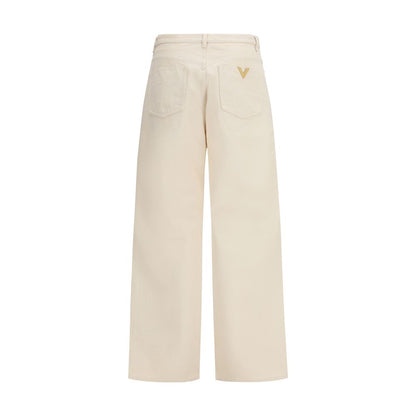 Jeans by Valentino Garavani for men in denim cotton beige & signature features an refined tailoring silhouette, showcasing a premium relaxed-fit & regular-fit with a and long cut for a refined tailoring look.