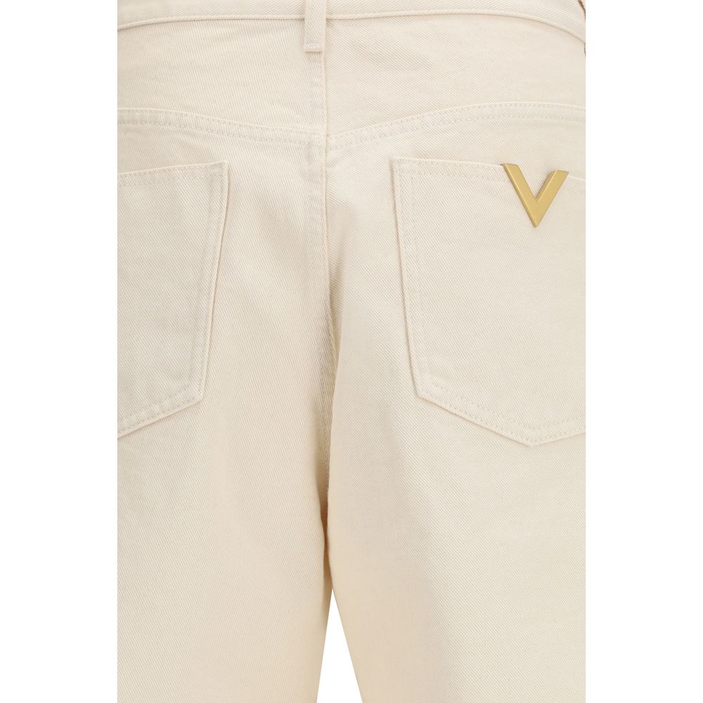 Jeans by Valentino Garavani for men in denim cotton beige & signature presents a tailored silhouette, showcasing a tailored relaxed-fit & regular-fit and long cut with a refined for a truly tailored aesthetic.