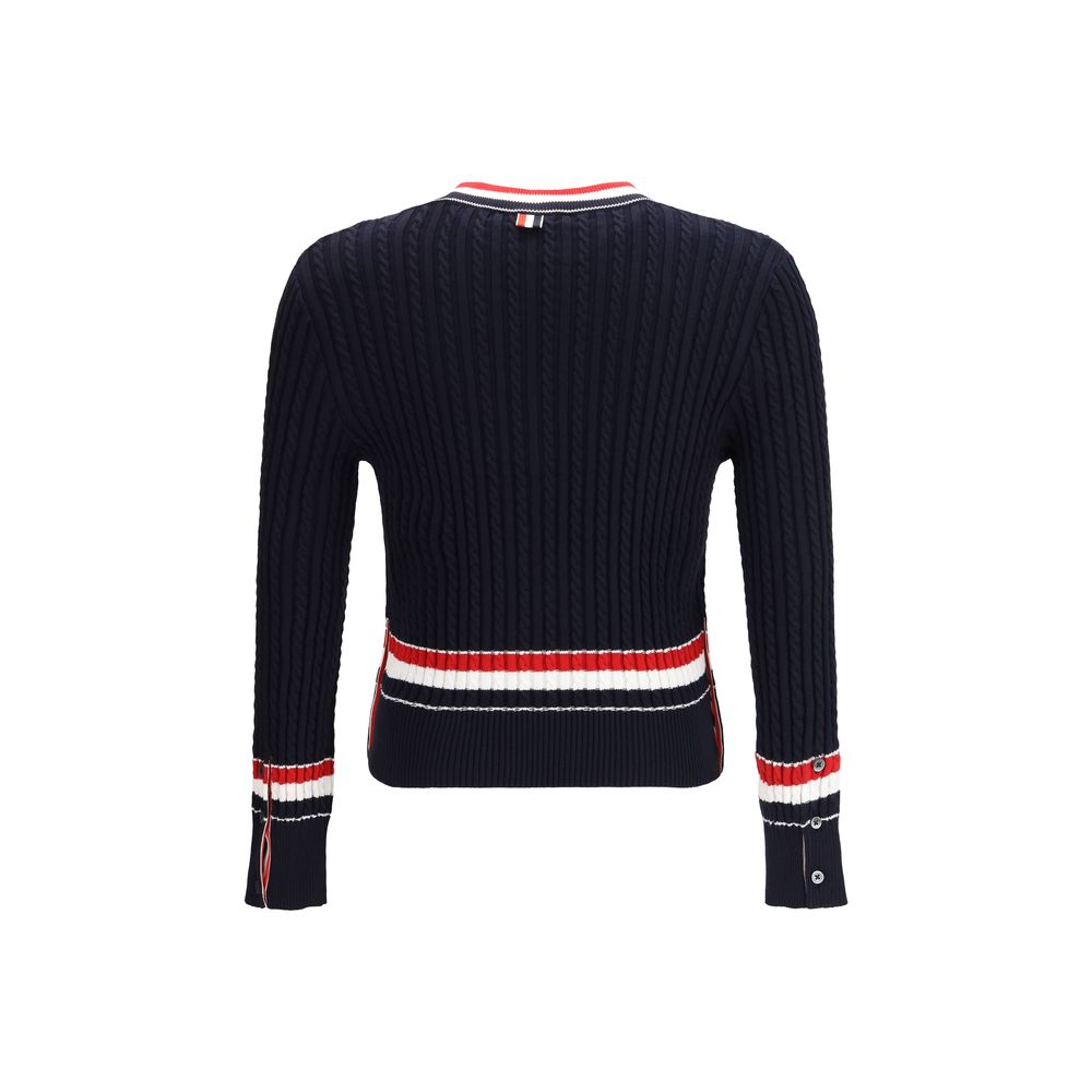 Sweatshirt by Thom Browne for men in cotton blue features an provocated silhouette, detailed with a provocated and a refined v-neck neckline for a sophisticated aesthetic.