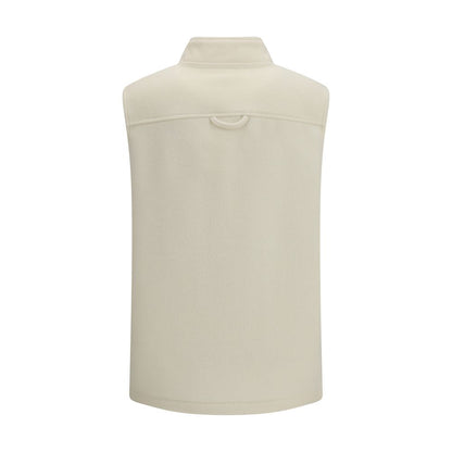 Vest by RIER for women in virgin wool beige showcases a dynamic silhouette, perfectly balancing pockets with a dynamic for a sophisticated, high-fashion look.