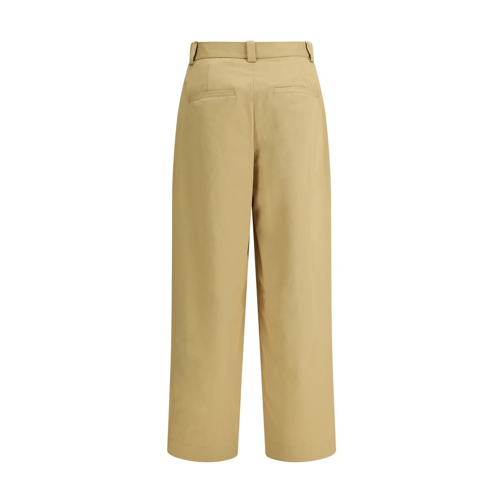 Casual Pants by Khaite for women in cotton beige features an sartorial regular-fit & wide and long with a cut for a sartorial finish.