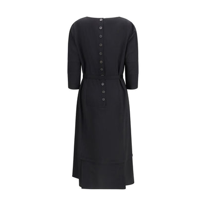 Dress by Prada for women in mohair wool silk & nylon black features a dramatic silhouette, showcasing an elegant round neckline and that flows into a dramatic midi.