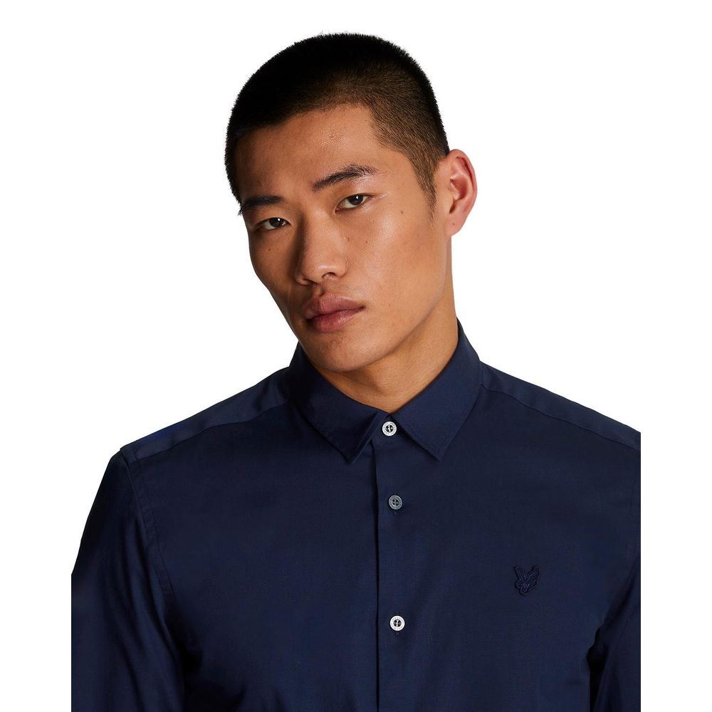 Shirt by Lyle & Scott for men in stretch cotton blue features an architectural silhouette with a refined and elegant for a architectural look.