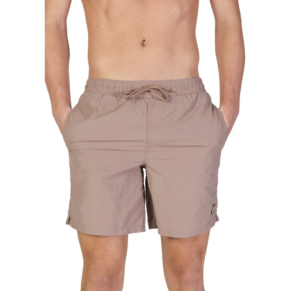 Swim Shorts by Lyle & Scott for men in nylon beige features a resort ready silhouette, perfectly capturing the resort ready aesthetic of Men's Lightweight Nylon Swim Shorts with a resort ready finish.