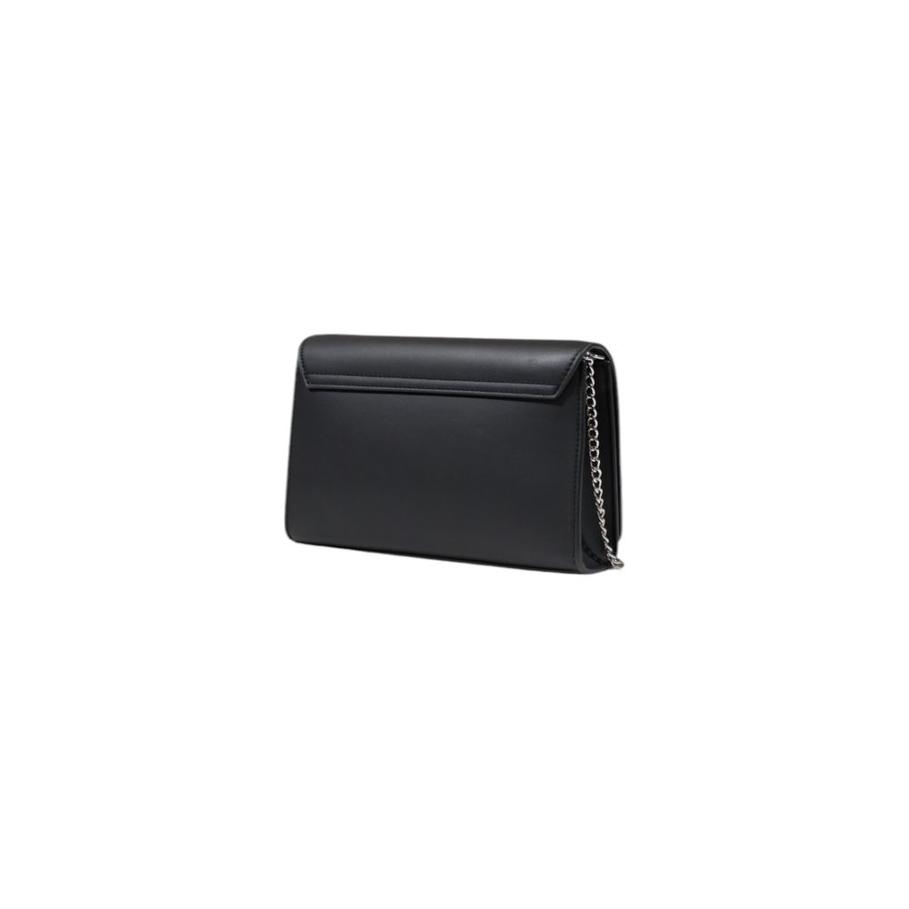 This Small Flap Handbag by Love Moschino for women in polyethylene & polyurethane and black presents a sculptural silhouette featuring a secure flap, ample , and versatile for a sculptural finish.
