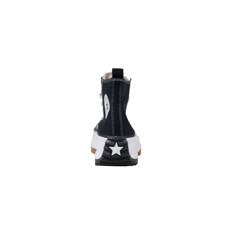 Sneakers by Converse for women in rubber & fabric black & white presents a sumptuous silhouette as Women's Lightweight Casual Rubber & Fabric Sneakers, expertly defined by a sumptuous casual style for a sumptuous, high-fashion look.
