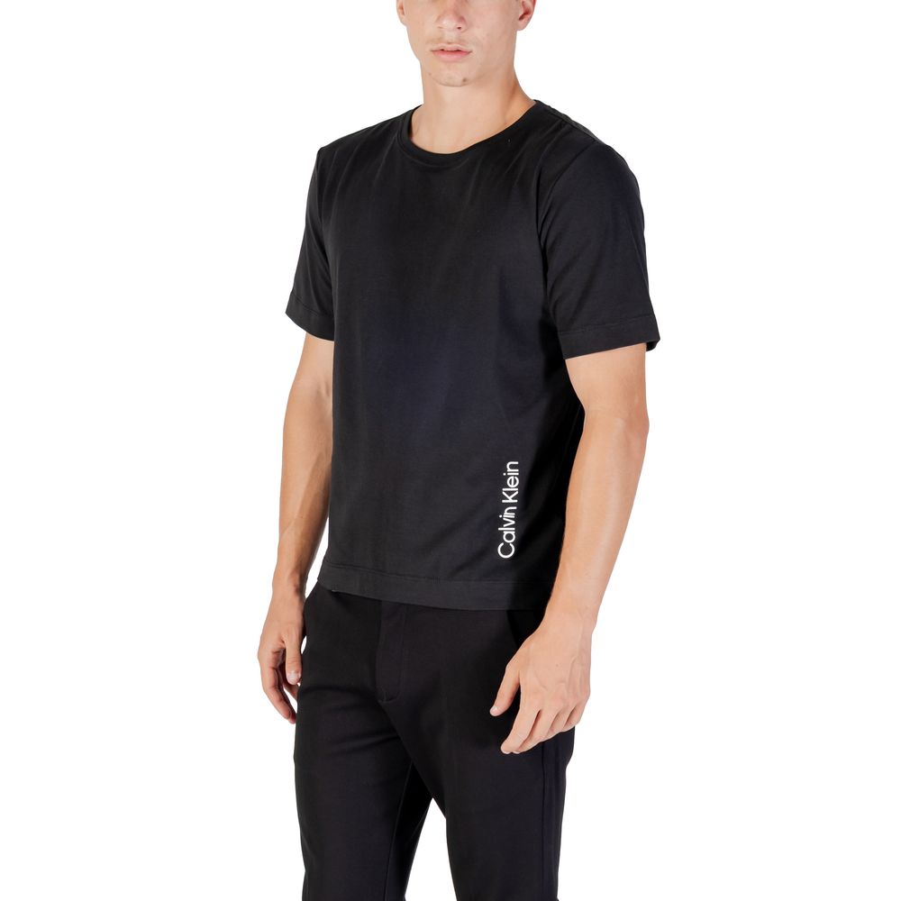 Activewear Top by Calvin Klein Sport for men in stretch polyester cotton black features an contemporary silhouette with , , and a contemporary .