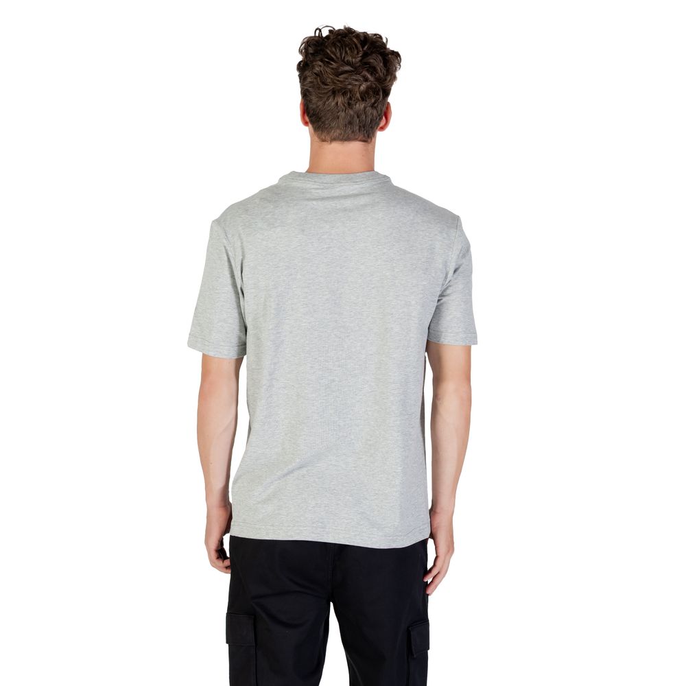 T-Shirt by Calvin Klein Sport for men in stretch polyester cotton gray features an on trend silhouette, perfectly showcasing a on trend and for an elevated aesthetic.