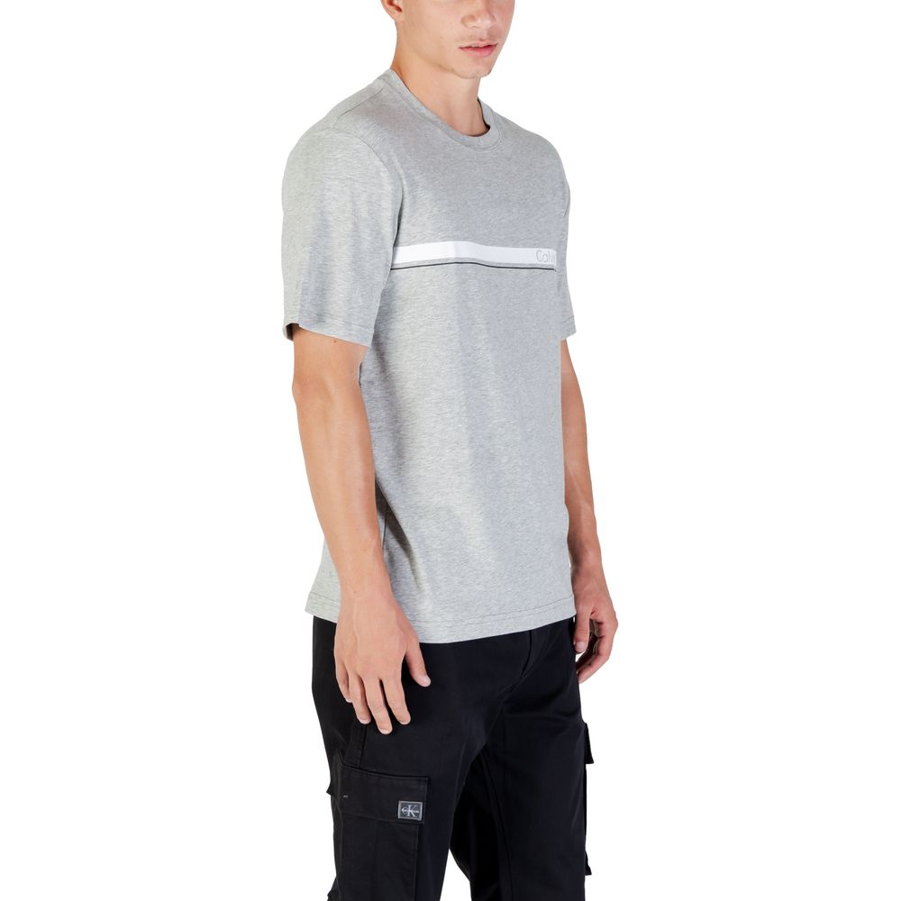 T-Shirt by Calvin Klein Sport for men in stretch polyester cotton gray showcases a dramatic silhouette, elegantly detailed with a dramatic and for a truly dramatic finish.