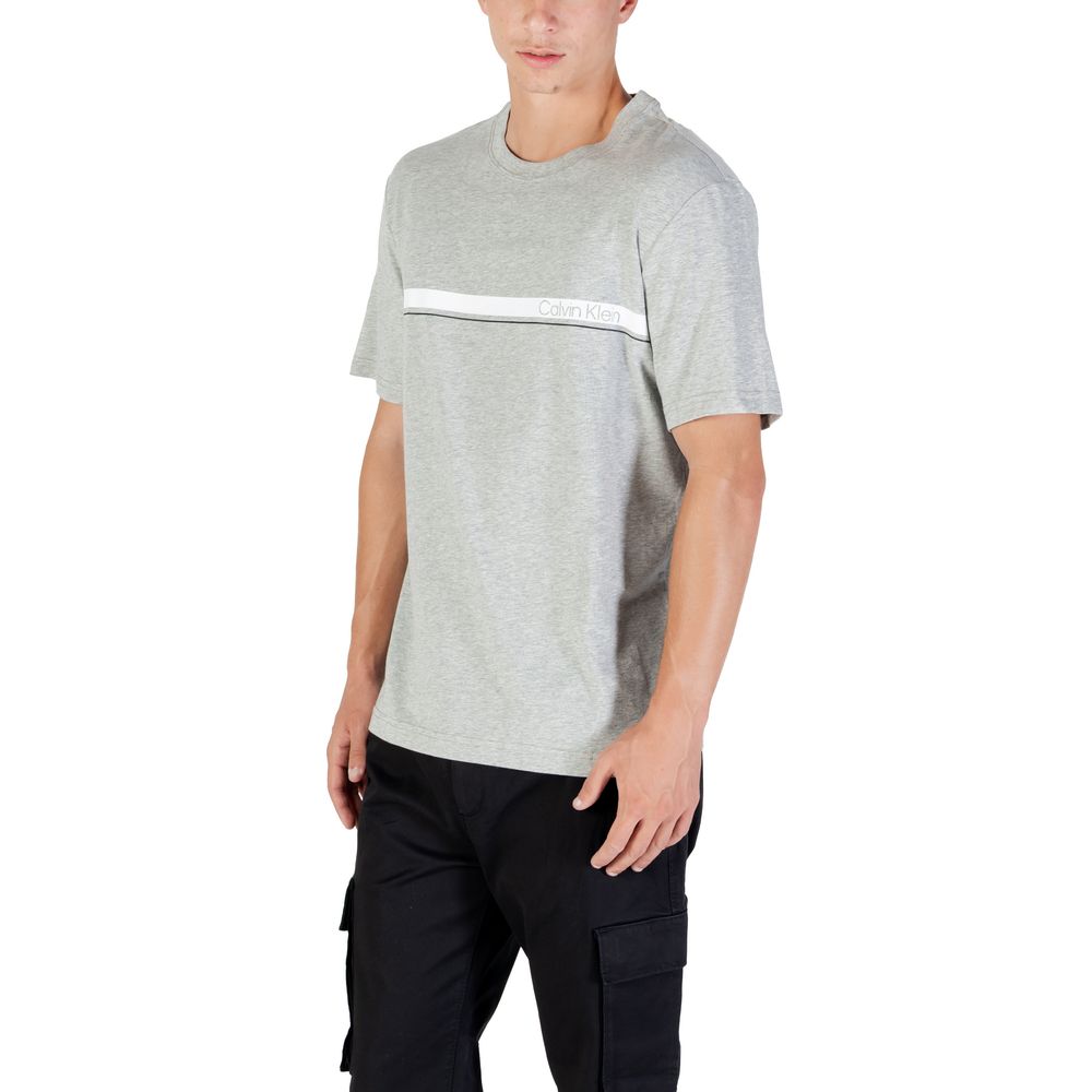 T-Shirt by Calvin Klein Sport for men in stretch polyester cotton gray showcases a unassuming silhouette, artfully detailed with a refined and unassuming for a sophisticated, contemporary look.